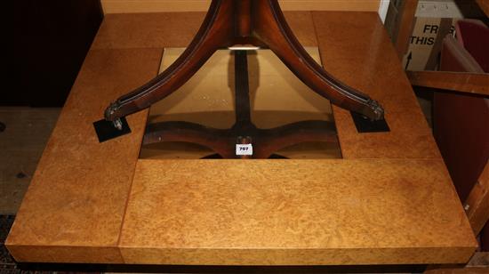 A modern burrwood occasional table,